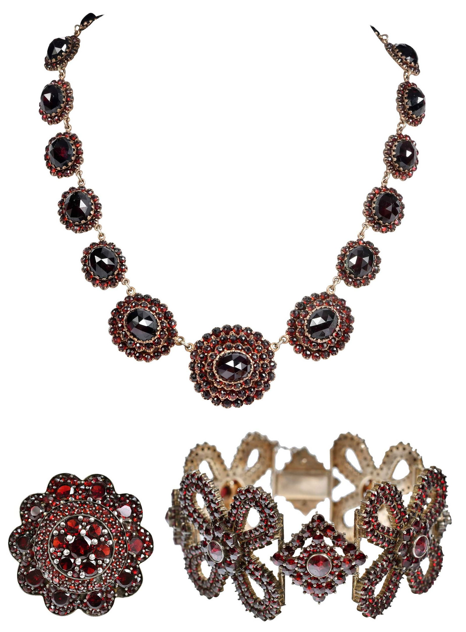 Vintage Bohemian Garnet Suite, Necklace, Bracelet and 14kt. Ring: 19 oval rose cut garnets, three rows halo of round rose cut garnets, approx. 26.0 x 27.0mm, flanked by two rows halo of round rose cut garnets, and one row halo of round rose cut garnets, unmarked, te