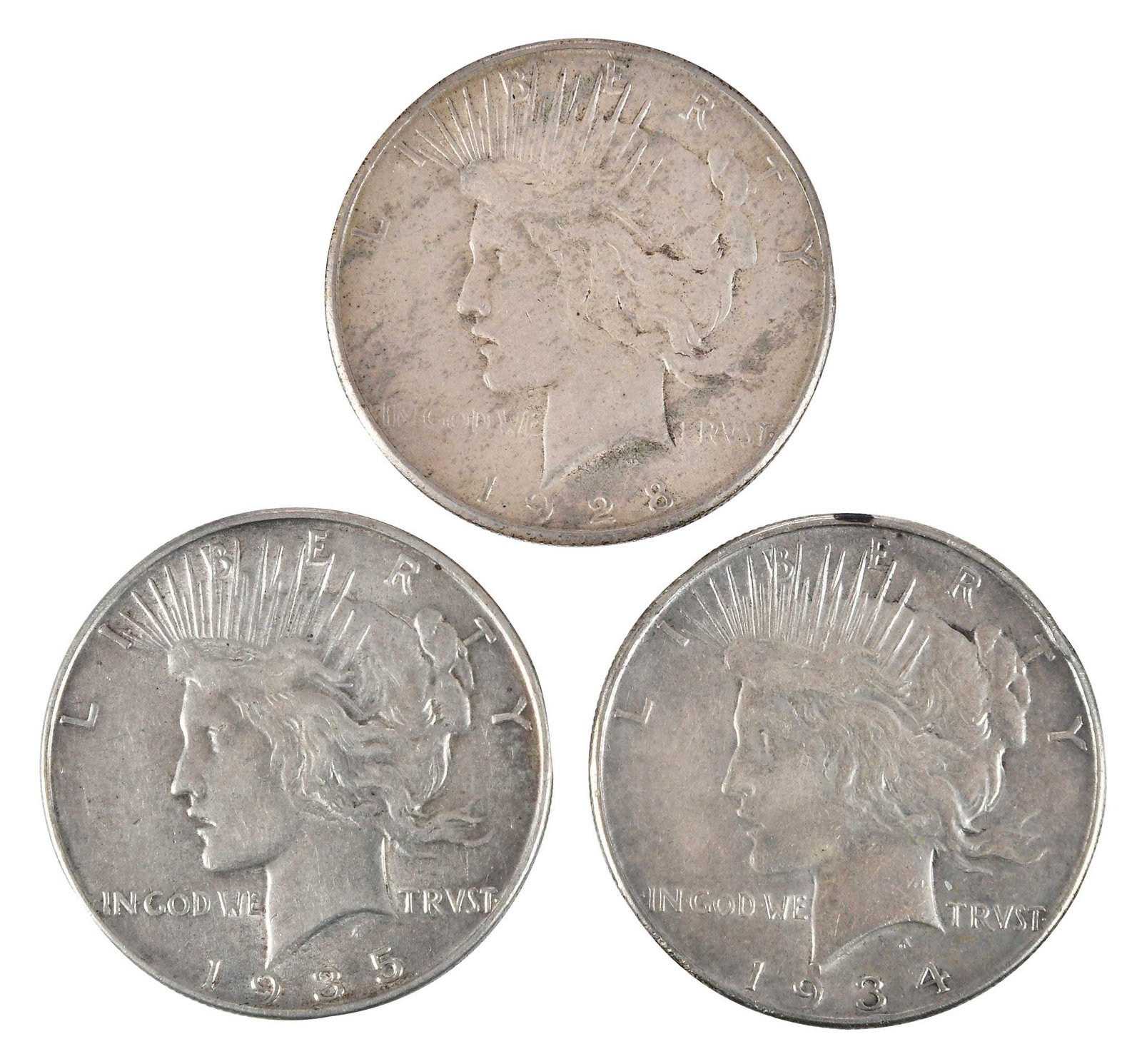 13 Peace Silver Dollars: assorted mix with some later dates included such as 1928-S, 1934, and 1935 Provenance: Private Collection