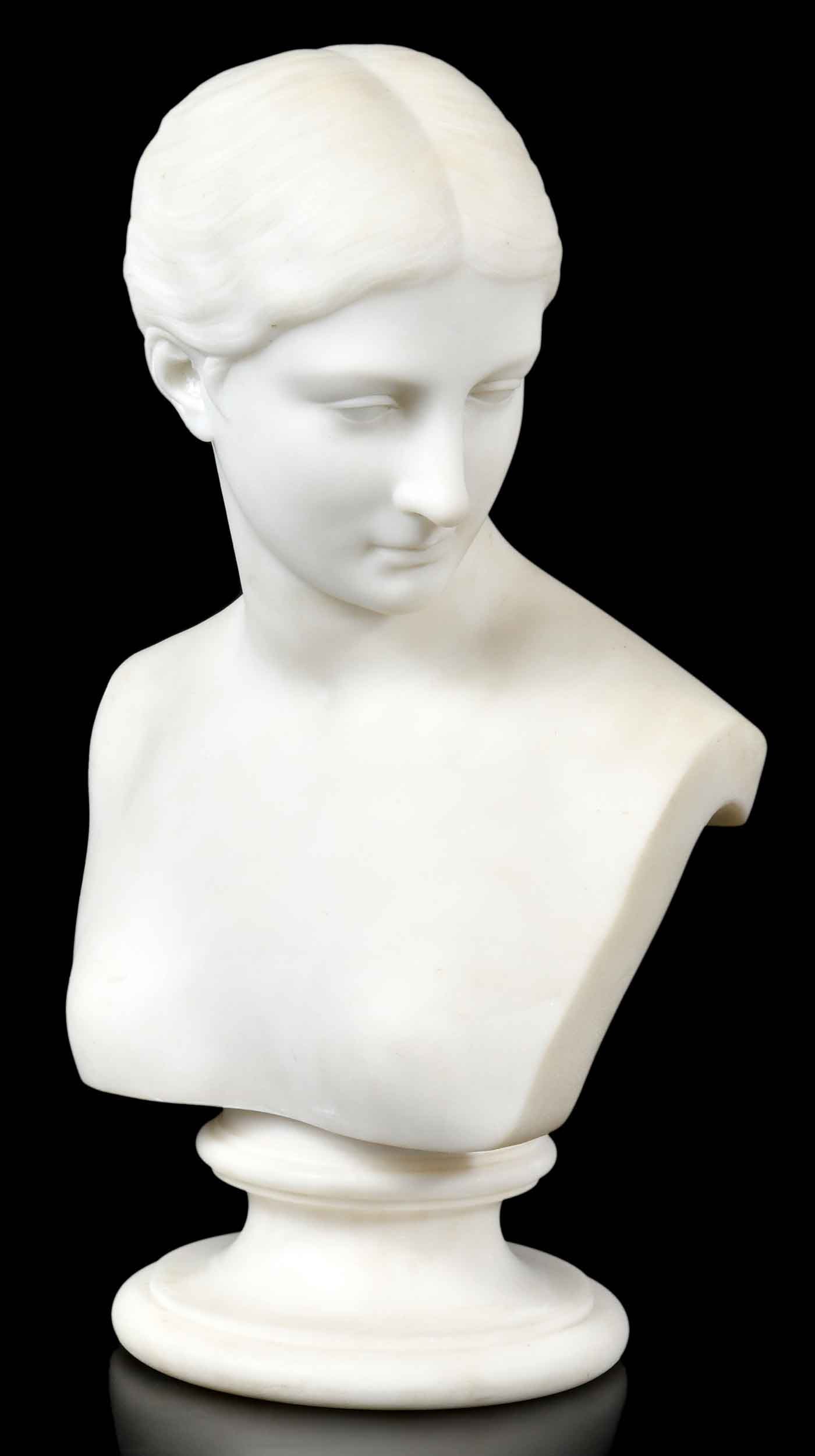 Studio or Follower of Hiram Powers, The Greek Slave: (Italy/American,1805-1873) The small bust version, bearing signature on back of truncation "H.P./sculp", carved Carrara marble, 13 x 9 x 7 in., overall 16-1/4 x 9 x 9-1/2 in. Provenance