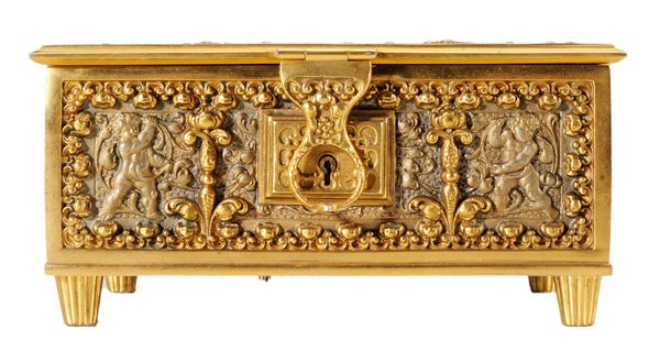 Cast Bronze Rectangular Casket-Form: Music Box Continental, early 20th century, hinged cover with standing [putti] and scrolling vines and flower heads, conforming panels, navy velvet-lined interior with compartments, raised on tapering 