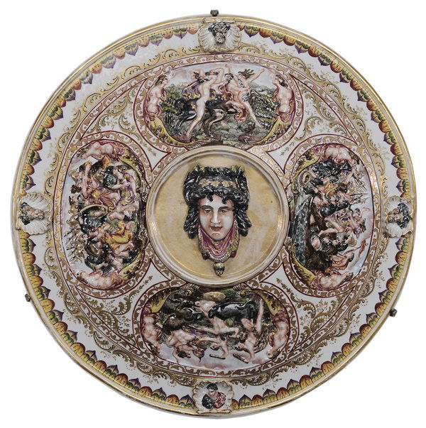 Capodimonte Porcelain Shield-Form: Plaque Continental, late 19th/ early 20th century, central medallion with classical head surrounded by scenes with classical figures, crown-over-N mark, 23-1/2 in., good condition. Provenance: Propert