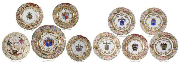 Ten Armorial Capodimonte Porcelain: Plates Continental, 19th and 20th century: nine with coats-of-arms, all with extensive gilt decoration, borders with figures in pleasurable pursuits, all with crown-over-N mark, 7-5/8 in. to 10-3/4 in