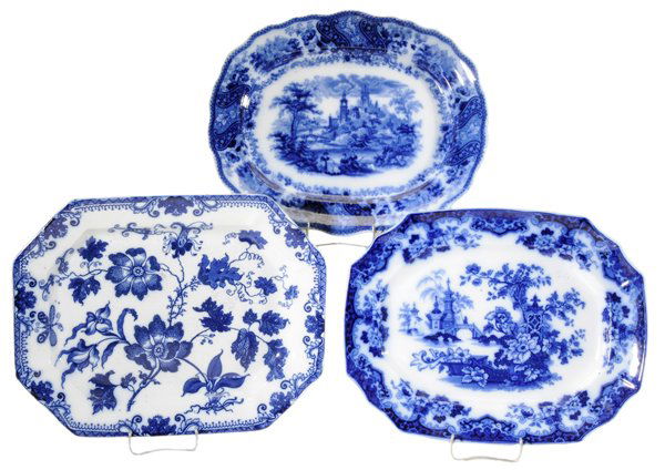 Three Flow Blue Platters: one with flowers and vines, "Chinese Plant", 16-1/2 in., [some crazing and discoloration;] one with Italianate scene, "Sobraon", 16 in.; one with Italianate scene, impressed mark for D&L, 15-1/2 in.,