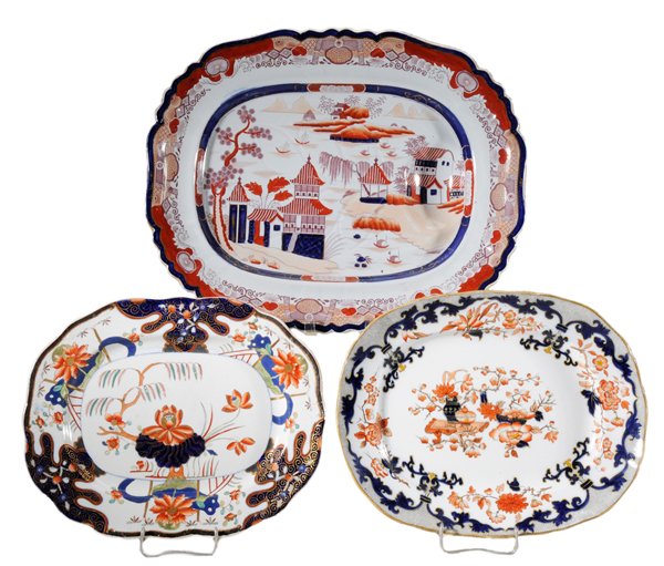 Three Imari Style Platters: British, 19th century, all with cobalt, iron red and gilt decoration: one well-and-tree design, printed purple mark "Real Ironstone China", 20-1/2 in.; one unmarked, 15 in.; one with impressed Minton 