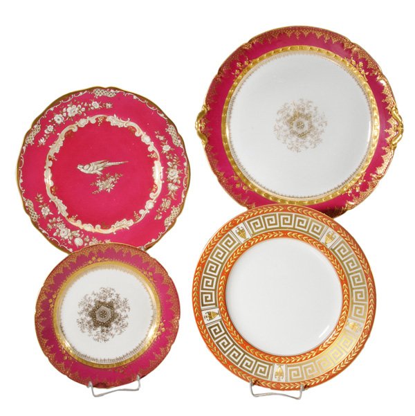 Twenty-One Gilt-Decorated Plates: English and Continental, 20th century: twelve with Greek key and gilt borders, Minton retailed by Tiffany, New York, 10-1/2 in.; five Haviland, magenta borders with gilt highlights, one 12-1/4 in., fo