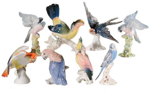 Eight Porcelain Bird Figures: English and Continental, 20th century, makers include Royal Worcester, Royal Copenhagen, German, two by J.T. Jones (Staffordshire), [one small wing chip,] 6 in. to 8-3/4 in., all in good condition exc