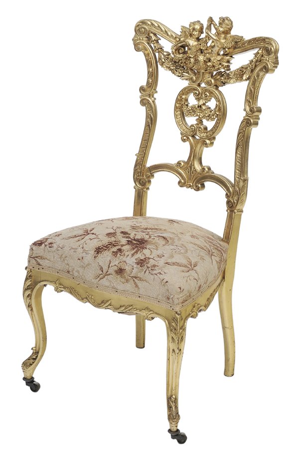 Louis XV Style Figurally Carved and: Gilt Ballroom Chair French or Italian, late 19th/early 20th century, the back elaborately carved with [putti] holding garlands of flowers, tapestry style upholstery, brass casters, 40 x 20-1/2 x 19 in