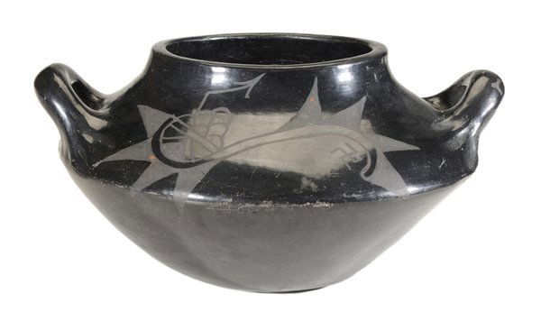 San Ildefonso Blackware Bowl: San Ildefonso Pueblo, 20th century, the black-on-black double-handled bowl, gloss and flat black stylized design at sides, signed illegibly on the base, 5-1/2 x 10-1/2 in. at handles, good condition
