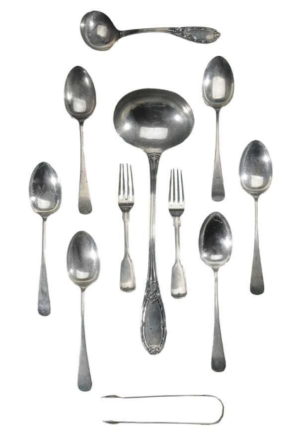 Eleven Pieces Silver Flatware: coin silver punch and sauce ladle, olive style pattern handle, partial pseudo hallmarks, monogram, 7-1/2 in. and 13-1/2 in.; two coin silver forks, fiddle and thread handle, marked “Ladd & Bigelow��