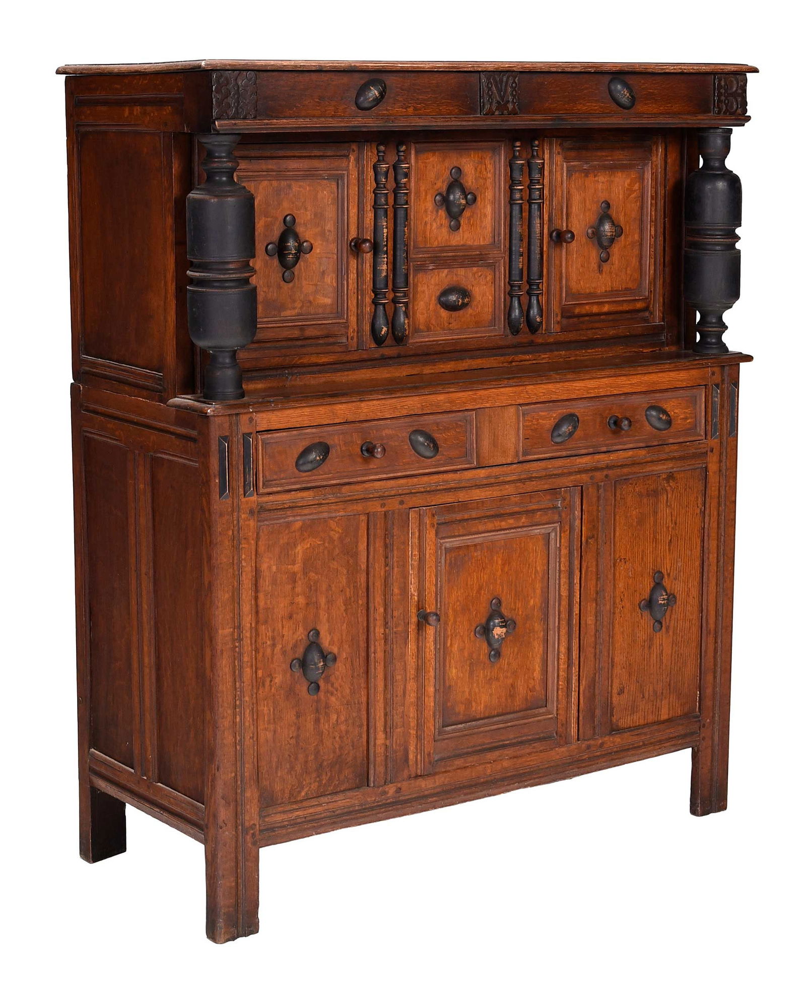 Rare New England Pilgrim Century Oak Court Cupboard: possibly John Taylor shop, Harvard College, circa 1680, the top with three carved panels with initials "IMB", two case construction, the upper section with two paneled doors, lower section with single