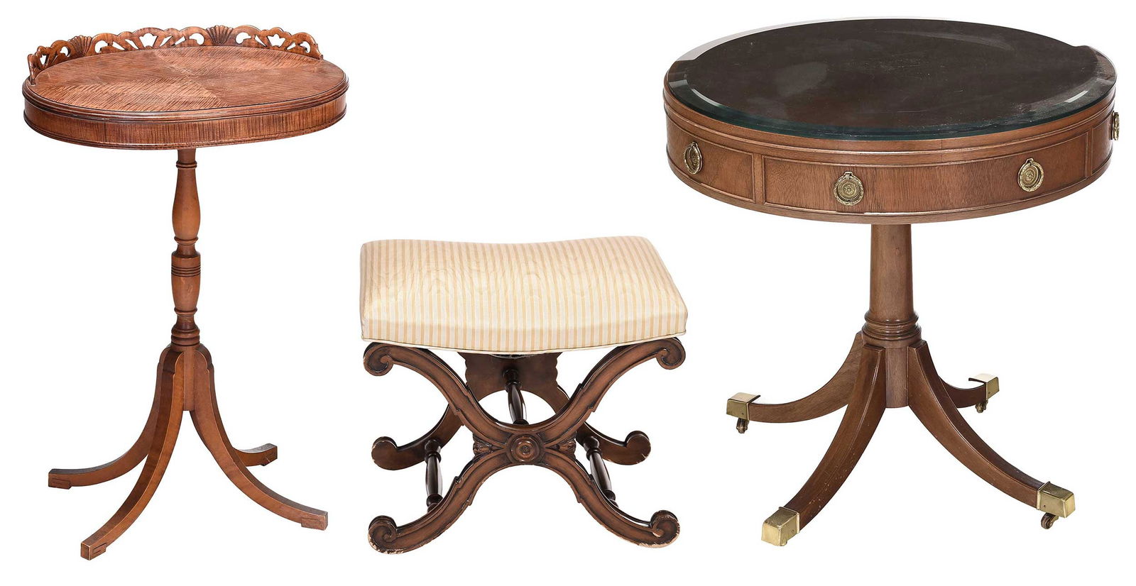 Baker Pedestal Table with Smith, Watson Upholstered Footstool, and Maple Side Table: mahogany pedestal table with brass tag for Baker, glass top and single drawer, brass casters, together with a curule form upholstered footstool with metal tag for Smith and Watson and maple side table
