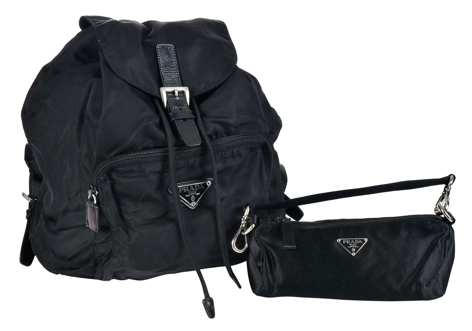 Prada Tessuto Backpack and Miniature Baguette: Italy, comprising: small drawstring bag, with leather accents and silver tone hardware, adjustable back straps, 11 x 12 x 8 in.; cylindrical diminutive bag, 3-1/4 x 8 x 2-1/2 in., with original dust b