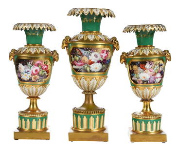 Three Piece Finely Enameled Green and Gilt Porcelain Garniture Set: English, 19th century, possibly Minton, unmarked, each of tall urn form with ram's head side handles, on cylindrical plinth and square base, green ground with gilt scrollwork highlights, central carto