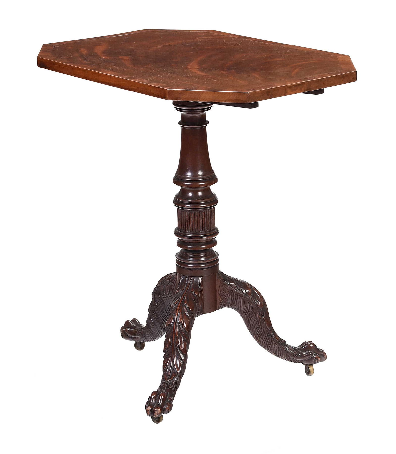 Rare Classical Carved and Figured Mahogany Tilt Top Candle Stand: New York, circa 1815, attributed to Duncan Phyfe, paw form feet with casters, carved hair and acanthus legs, 28-3/4 x 19 x 27-3/4 in. Provenance: Harry Arons, Connecticut; Sotheby's January 29, 1983 l