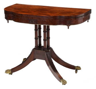 Classical Carved and Figured Mahogany and Brass Inlaid Games Table: New York, circa 1815, attributed to Duncan Phyfe (1768-1854), poplar secondary, brass paw form casters, 28 x 35-1/4 x 18 in. Provenance: Sotheby's, New York, January 1988, sale 2130, lot 494; Virginia