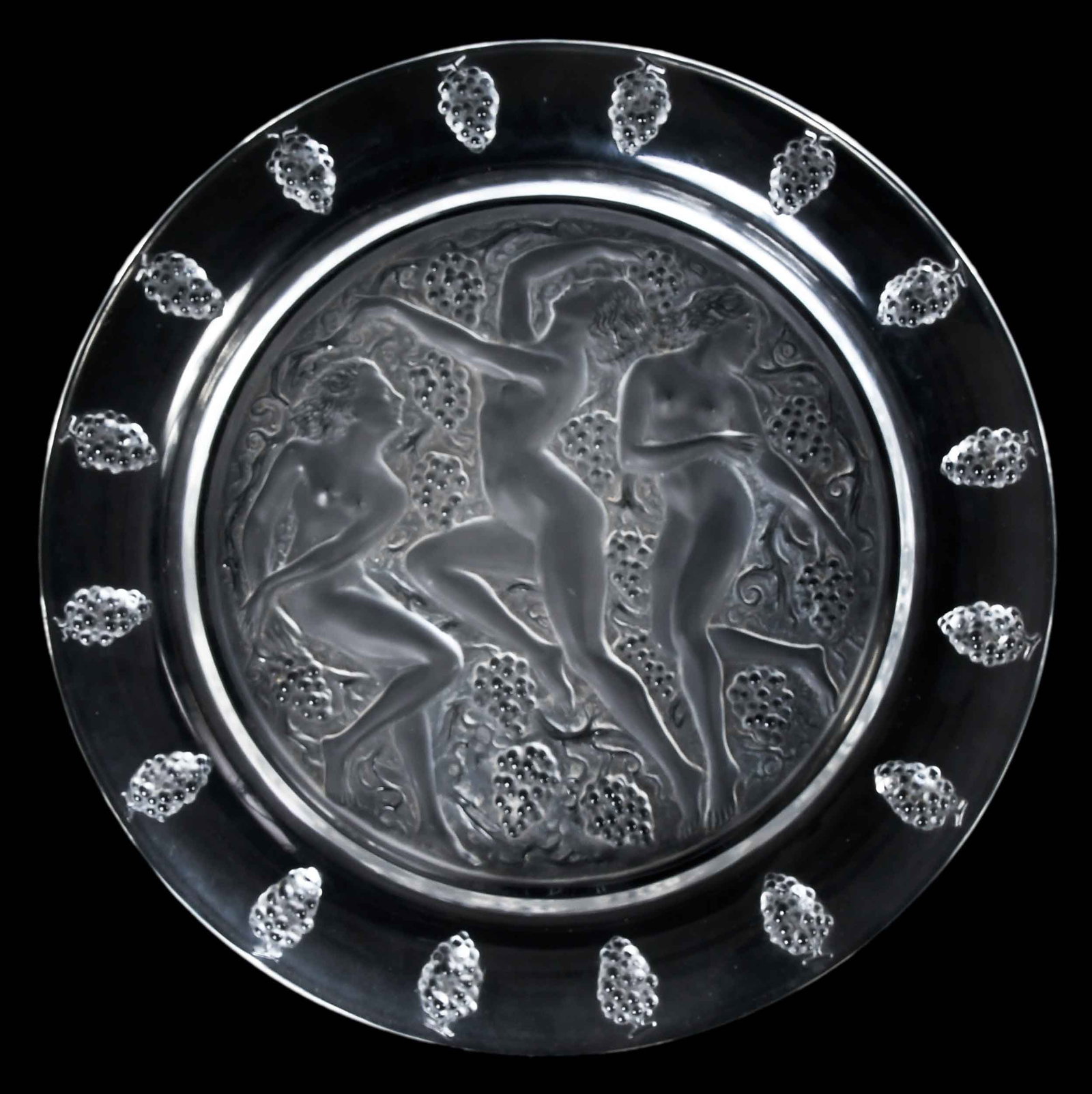 Lalique Cote d'Or Glass Charger: France, second half 20th century, molded and acid etched glass with impressed grapes and female figures in revelry, marked "LALIQUE FRANCE" at base, 1-5/8 x 15-3/4 x 15-3/4 in. Provenan