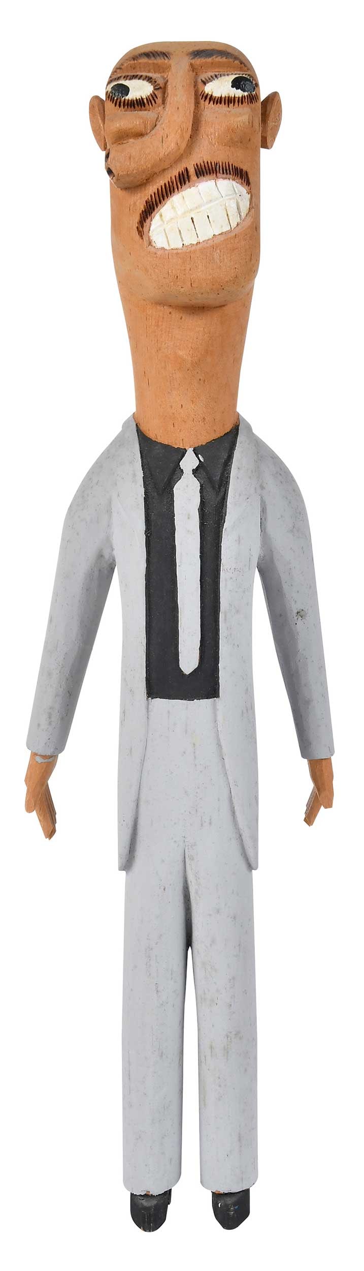 Sulton Rogers: (American/Mississippi, 1922-2003) Man in Gray Suit, unsigned, carved and painted wood, 15-1/8 x 4-1/4 x 2-5/8 in. Provenance: Private Collection, Asheville, North Carolina