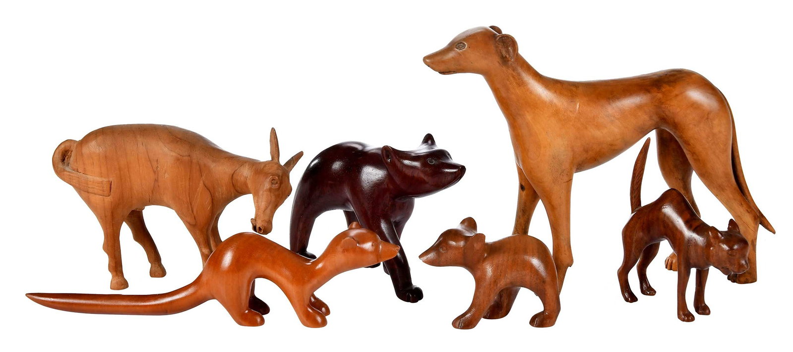 Six Cherokee Carved Wood Animals: American, 20th century, five with signatures to undersides including "Watty Chiltoski [sic]", "Cubs", "H. Nichols", "John [A.?] Taylor", and "D. Smith"