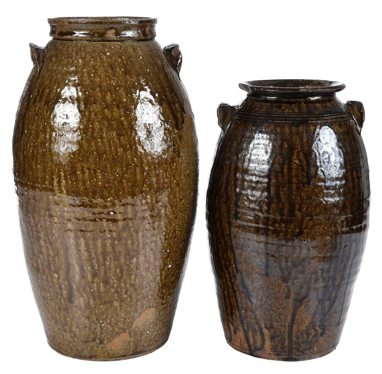 Two Catawba Valley North Carolina Stoneware Vessels: (Catawba County, North Carolina, mid to late 1800s) elongated ovoid four gallon churn form, runny olive green alkaline glaze, incised "4" near one of two applied lug handles, tooled fla