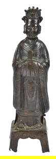 Chinese Bronze Daoist Deity Figure: possibly Ming dynasty, in the form of a robed figure with elaborate headdress and holding hu tablet, possibly Wenchang Wang, Daoist God of Literature and Culture, base verso with faded inscription,