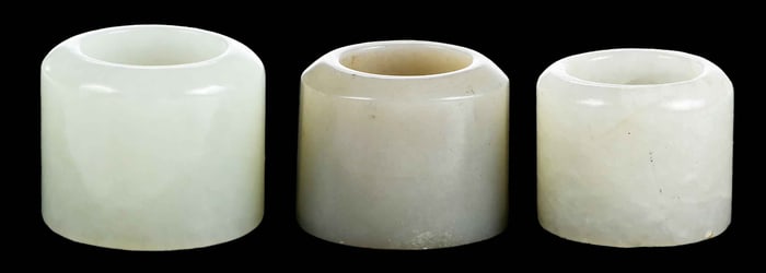 Three Chinese Carved Green Jade Archer's Rings