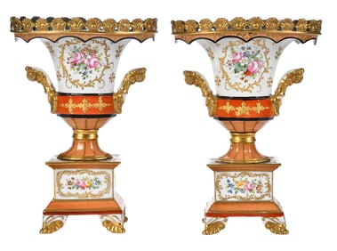 Pair of French Hand Painted and Gilt Porcelain Urns
