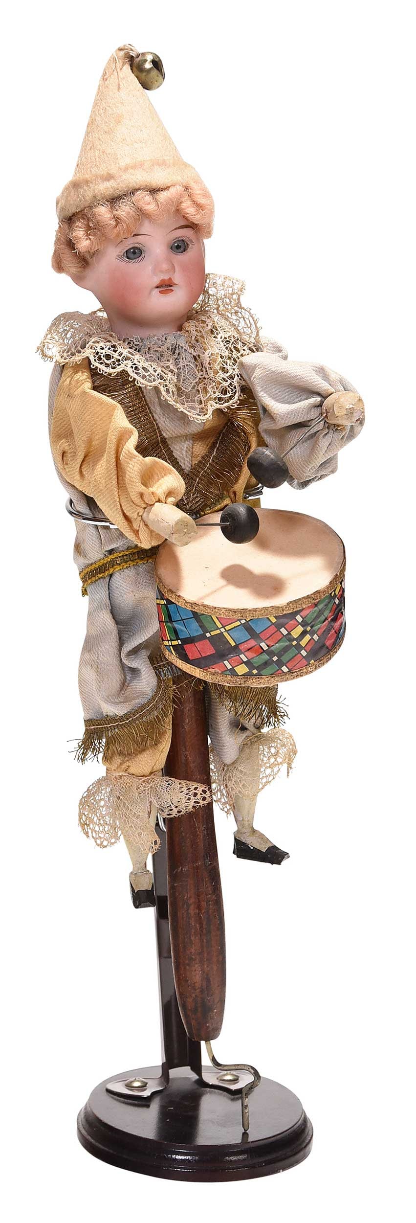 Automaton French Drumming Marotte: bisque head, hat with bell, hand crank at bottom, height 14-1/2 in.; on later stand Provenance: Theriault, Annapolis, Maryland tag; Private Virginia Collection