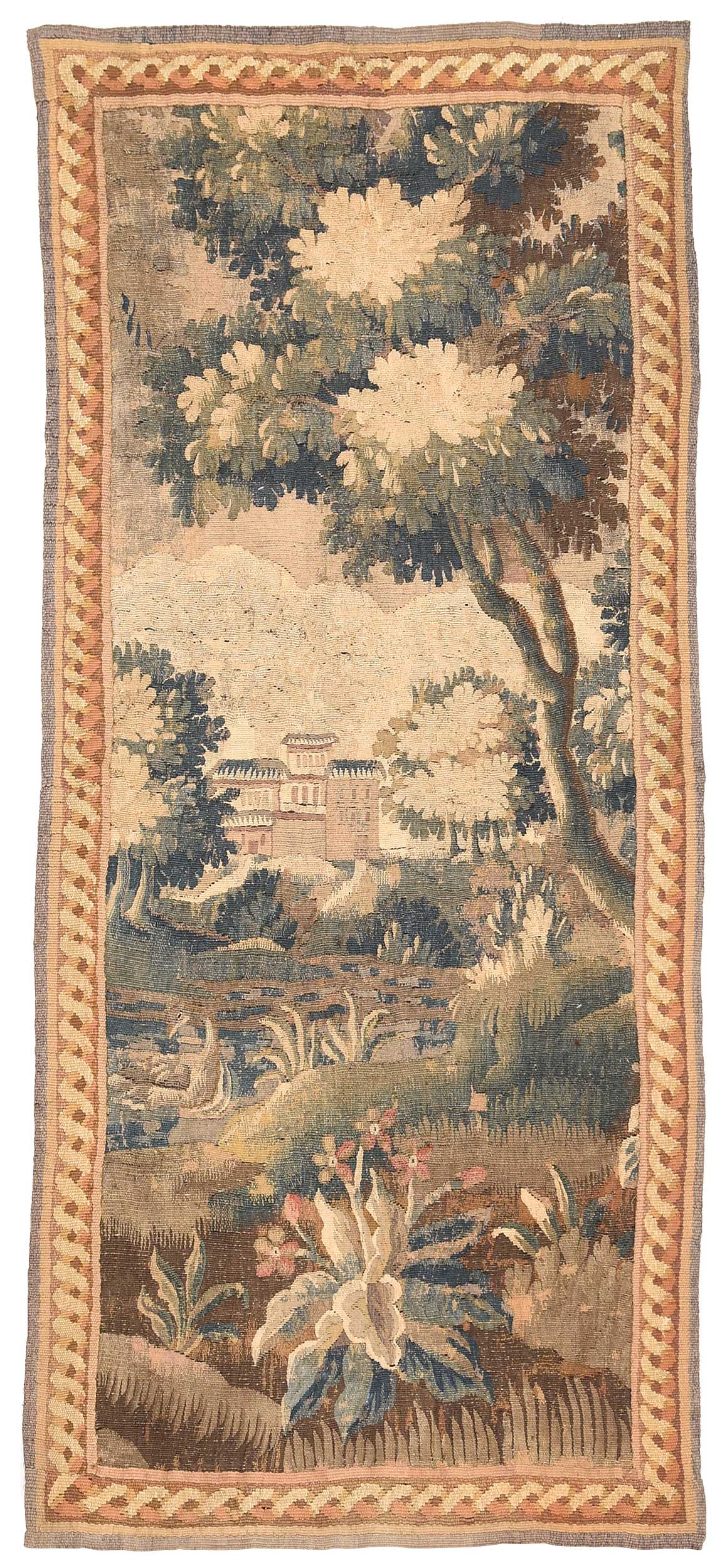Continental Verdure Wool Tapestry Fragment: likely French or Belgian, 18th century with later border, 74-1/2 x 32 in. Provenance: Private Collection