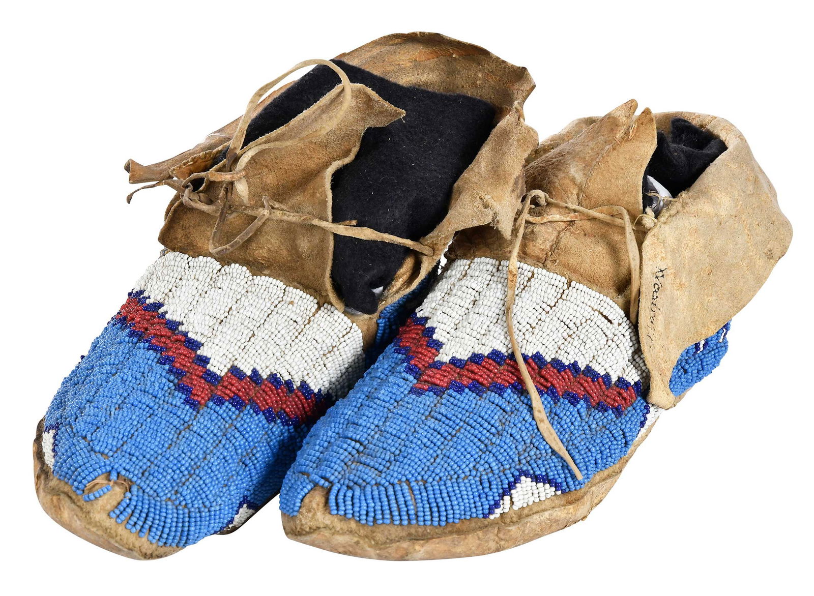 Lakota Beaded Hide Moccasins: late 19th/early 20th century, the men's moccasins with fully beaded uppers and sides, hide flaps, 9-1/2 in.