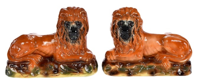Pair of Staffordshire Recumbent Lion Figures