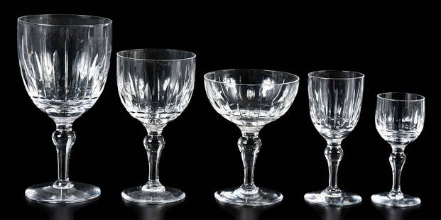 71 Pieces Stuart Crystal Stemware: English, most with marks for Stuart on base, comprising: twelve 6-1/2 in. water goblets; twelve 4-1/2 in. champagnes; eleven 4-3/4 in. sherrys; twelve 4 in. cordials; twelve 4-7/8 in. port wines; twel