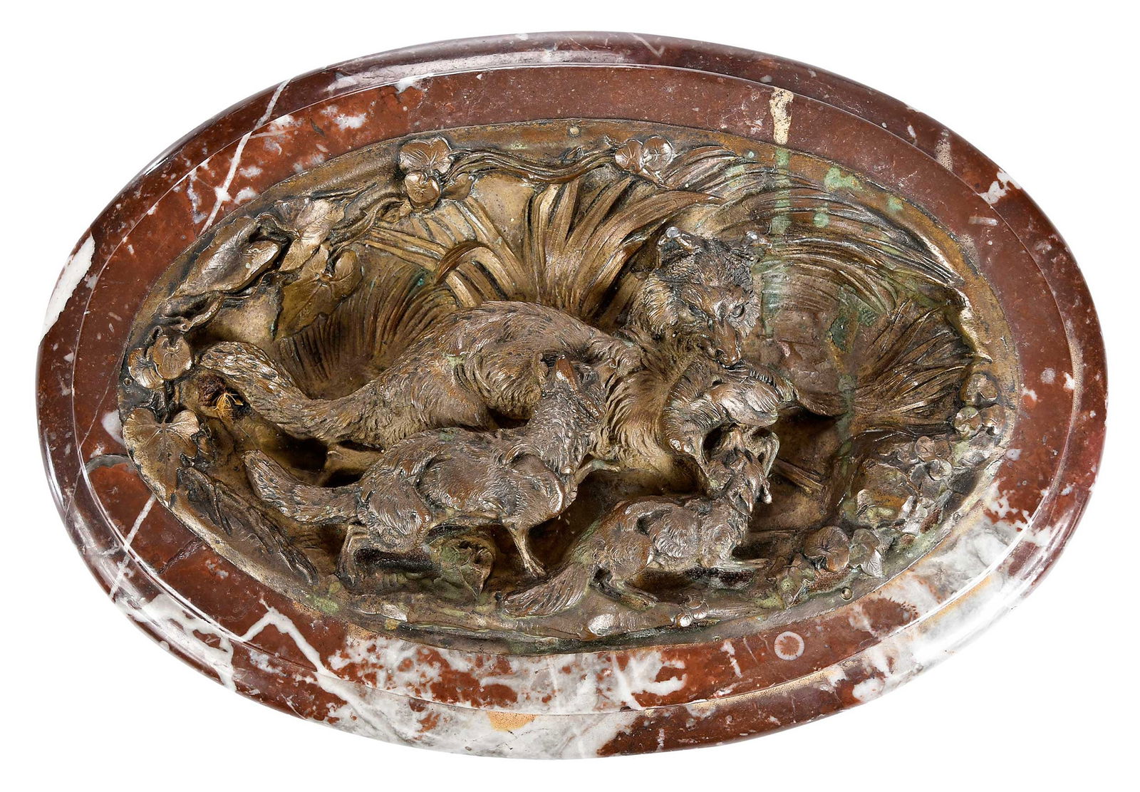 Bronze and Marble Naturalistic Pen Rest, Fox Feeding Young: possibly French, 19th century, a desk piece featuring a fox feeding two young kits in a marsh, unsigned, inset oval bronze relief in reddish/brown marble, 2-1/2 x 6-3/4 x 10 in. Provenance: