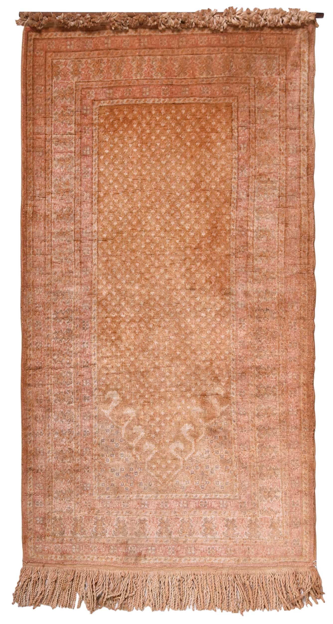 Prayer Rug: 20th century, mihrab, wool on cotton, 1 ft. 11 in. x 3 ft. 3 in. Provenance: Private Collection, Charlotte, North Carolina