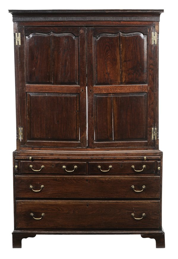 Georgian Oak Paneled Linen Press: British, late 18th/early 19th century, upper case with arched double-panel doors flanked by reeded columns, lower case with pull-out slide over four drawers and bracket feet, some inlay and rich dark 
