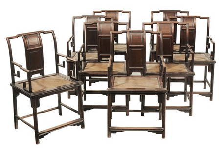 Set of Eight Chinese Hardwood Open-Arm: Chairs late 19th/early 20th century, in the Ming style, figured hardwood throughout with double-paneled central splats and woven fiber seats, 37 x 22 x 18 in., surface dirt, minor sun fading, finish l