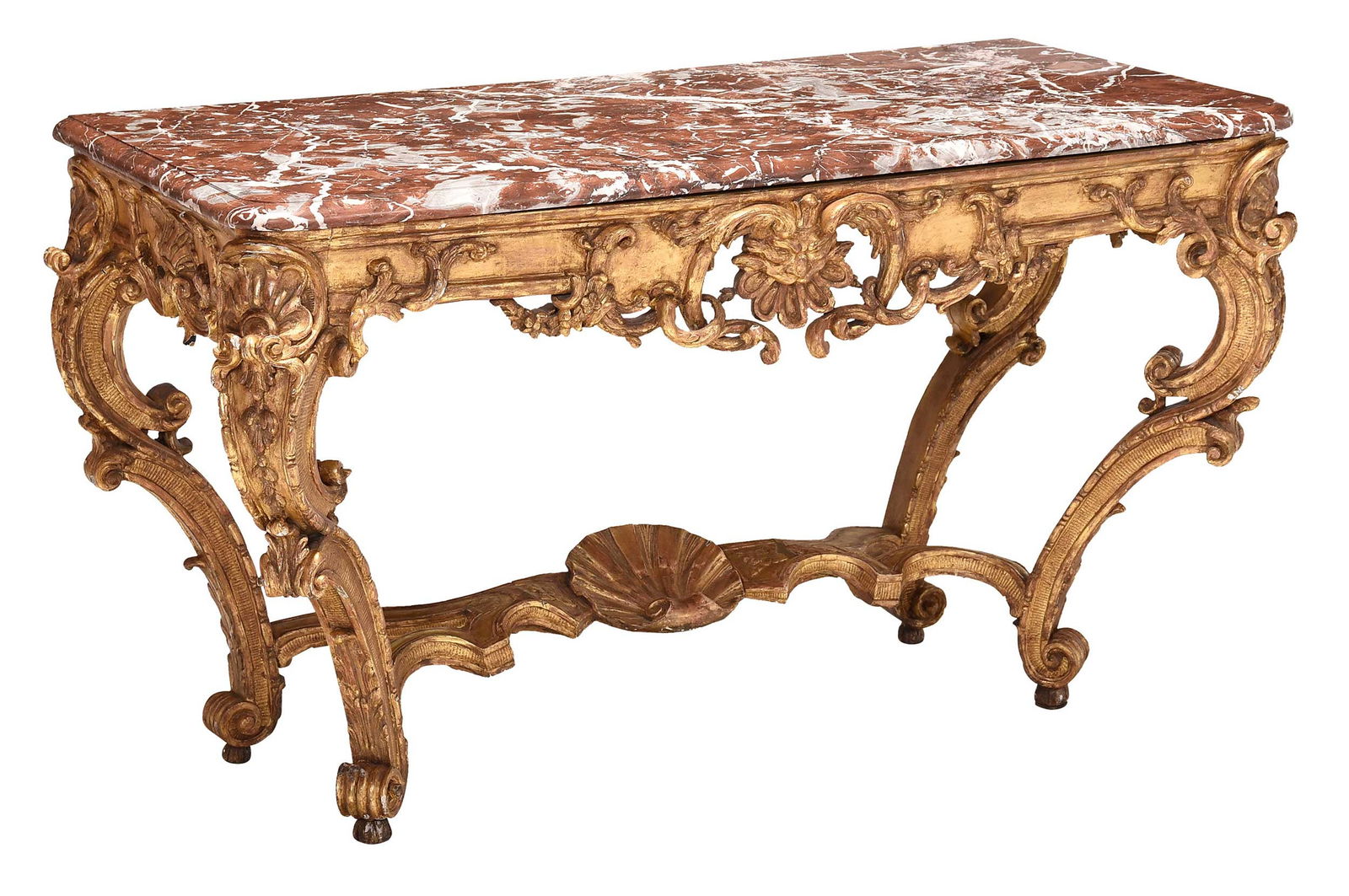 Italian Louis XV Carved Gilt Wood and Marble Top Console Table: Continental, 18th century, with variegated rosso antico molded marble top, carved and gilt frame with scallop shell decorated central stretcher, the skirt centering carved satyr mask, 33 x 55 x 26 in.