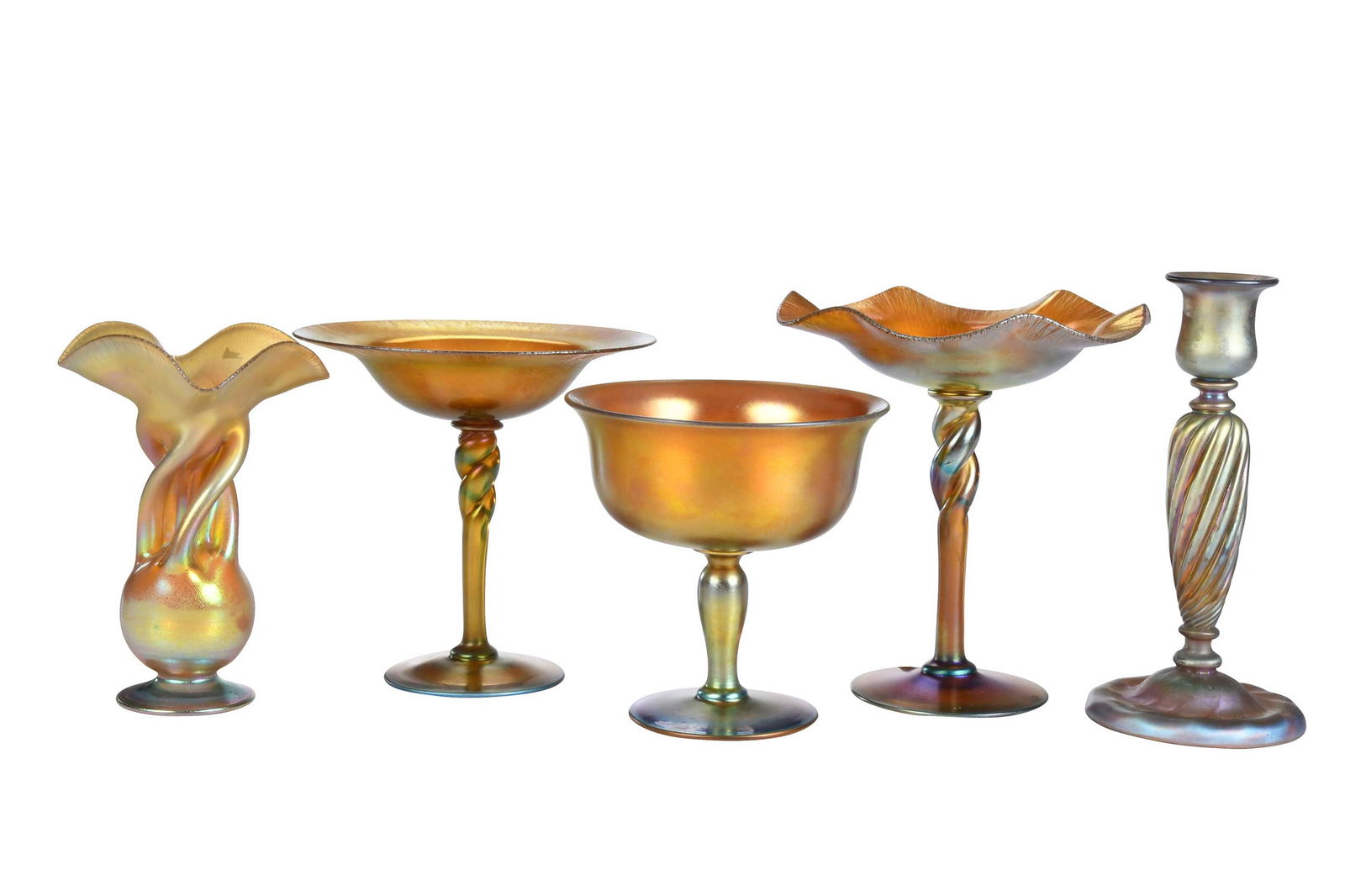 Five Steuben Aurene Glass Table Objects: American, 20th century, marked "Aurene" and numbered to bases, including three compotes, candlestick, and vase, largest 7 x 6-1/2 x 6-1/2 in. Provenance: Property From An Important Esta