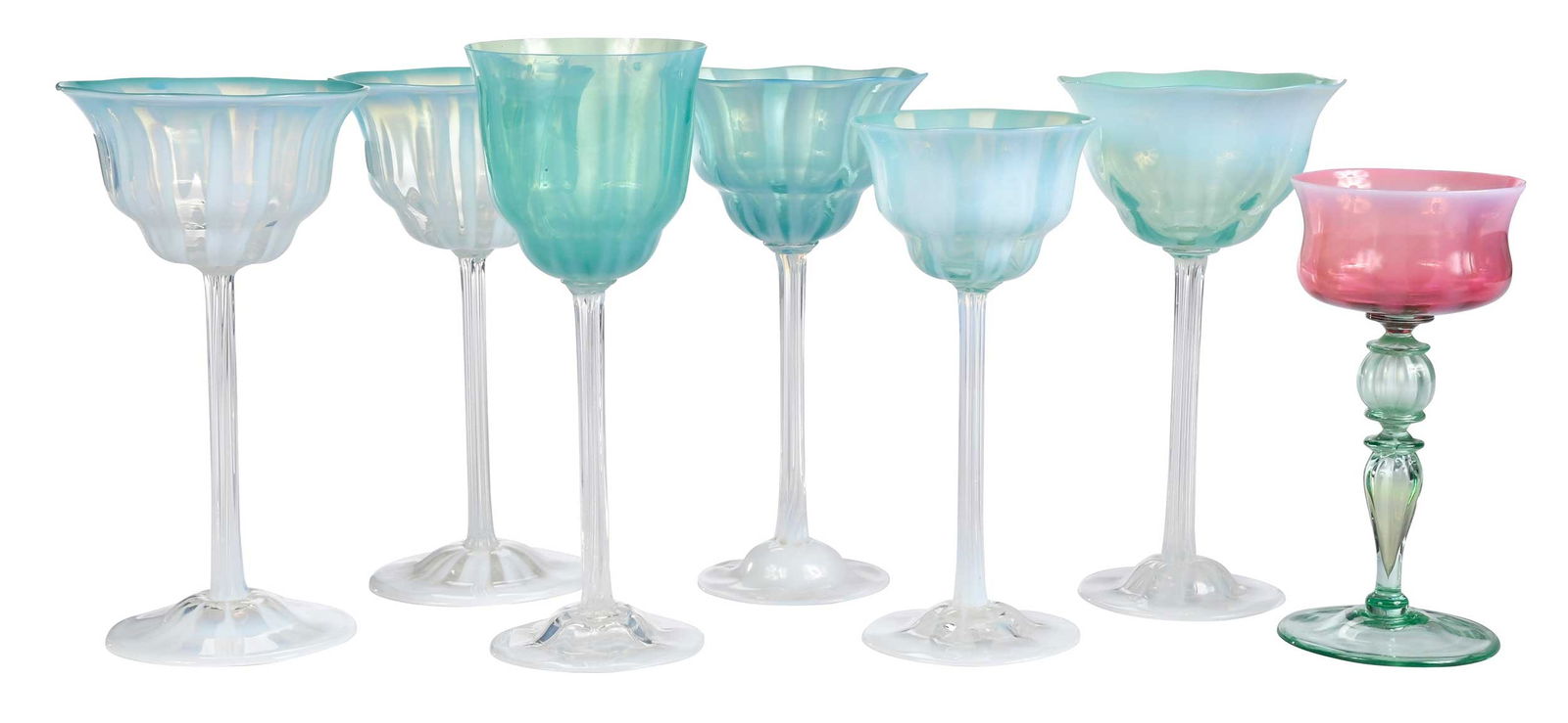 Seven Tiffany Pastel Favrile Stemmed Wine Goblets: American, 20th century, each marked "L.C.T. Favrile" to base, of varying color, form, and size, largest 8-1/4 x 3-1/4 x 3-1/4 in. Provenance: Property From An Important Estate, Maryland