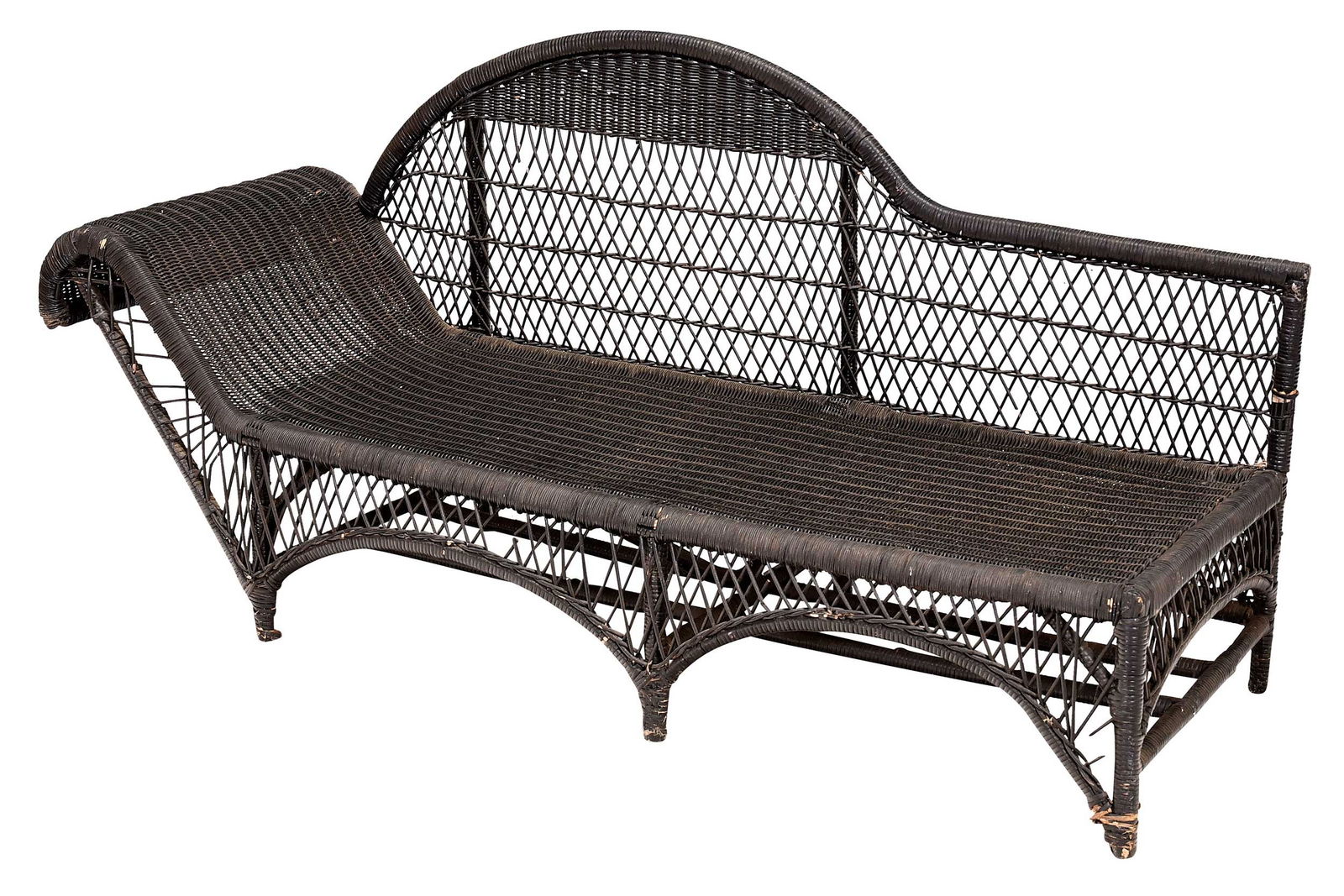 Wicker Chaise Lounge: possibly early 20th century, unlabeled, rolled head rest and arched back, with later black paint, 36 x 73-1/2 x 24 in. Provenance: Private Collection, North Carolina