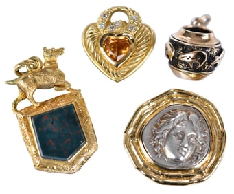 Collection of Four Gold Pendants