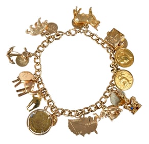 14kt. Assorted World Travel Themed Charm Bracelet
