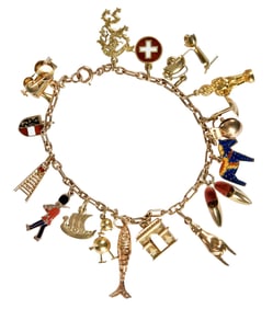 14kt. Charm Bracelet with Seventeen Small Charms