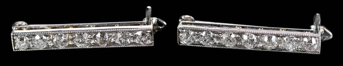 Two Platinum Cartier Daimond Bar Brooches