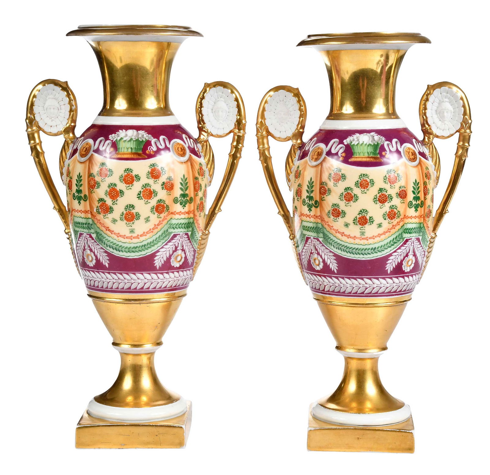Pair of Gilt and Enamel Paris Porcelain Vases Attributed to Darte Freres: circa 1820, tromp l'oeil decoration, bisque mask insets to handles, approx. 13-1/8 x 7 x 4-1/2 in. Provenance: Private New York Collection