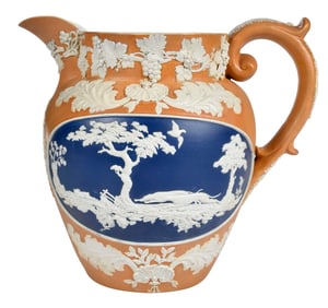 Fine and Rare Orange and Blue Ceramic Sprig Molded Pitcher