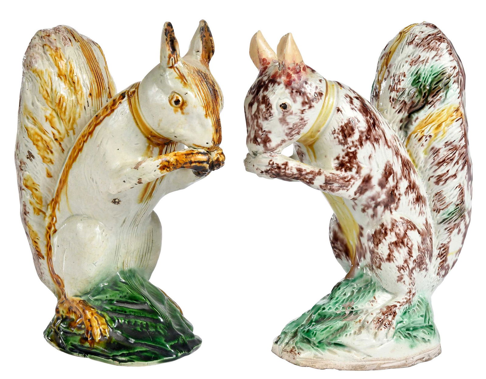 Two Rare Staffordshire Pottery Squirrels