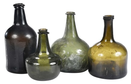 Four Early English Olive Green Glass Bottles