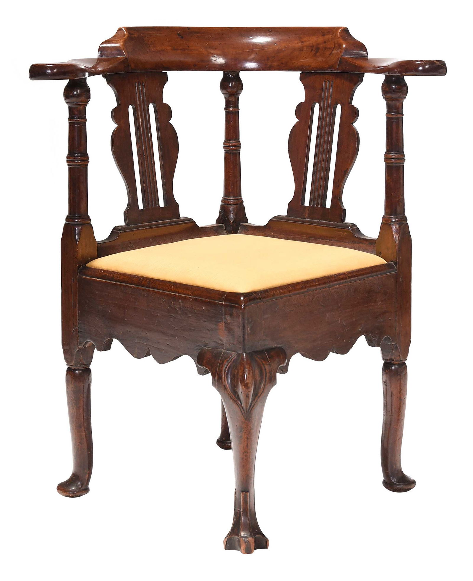 Important Bermuda Chippendale Cedar Corner Chair: mid 18th century, cedar throughout with rich dark color, horseshoe form back over pierced and fluted baluster form splats, turned supports, scalloped skirts, the front leg with cabochon carved knee an
