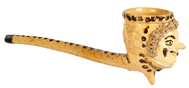 Rare and Monumental Slipware Pipe with Face