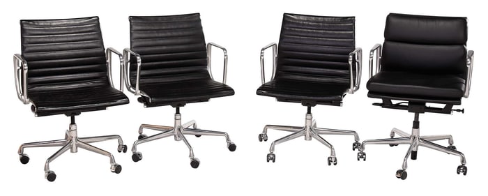 Four Eames Black Leather Office Chairs
